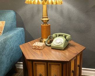 vintage brass and wood lamp, vintage rotary phone, vintage wood hexagon and rattan side table.