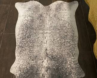 small quality faux cow skin rug, new