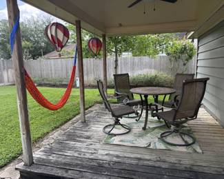 hot air balloon wind twirlers, colorful hammock and outdoor furniture