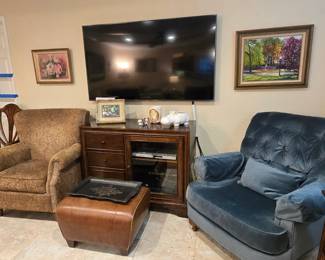 compact entertainment center, large TV, plush chairs, ottoman + original works of art!