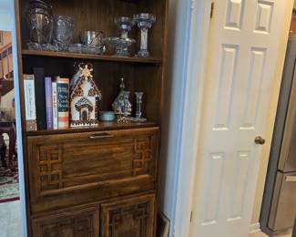 Drop front storage cabinet