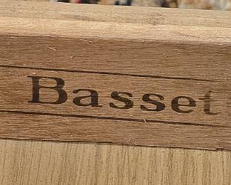 Bassett brand stamp on tables