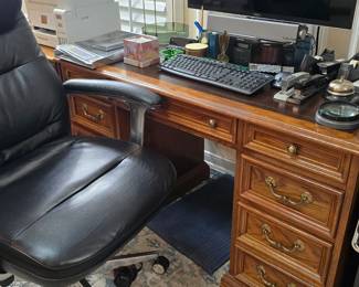 Hardwood desk #2 made by National Mt. Airy along with highbacked desk chair #2, more office supplies, a printer, monitor and computer towers