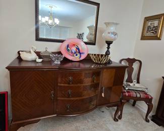 Antique buffet/sideboard with beautiful wood designs, antique electric hurricane lamp and more