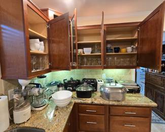 Lots of small appliances, cookware, bakeware, pots & pans, bowls, mixer, blender, slow cooker, toaster, grill, food processor and much more!