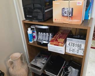 Cannon cameras, compact Bell & Howell slide projector