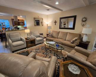 Nice selection of high end furniture including Lazy-Boy leather recliners, 4-piece Bassett occasional tables, oval, glass-topped coffee table, nice area rugs, lamps, wall decor and more!