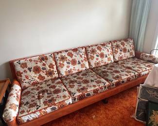 Mid-century modern vintage four person, Davenport orange color with floral pillows