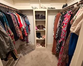 Closet full of women’s clothing and shoes