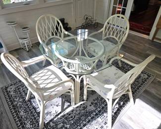 Glass top rattan table and chairs