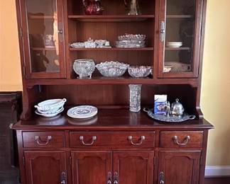 Lighted china hutch with wine holders, electrical outlets and glass shelves