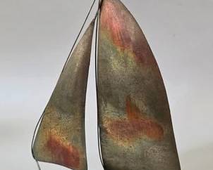 Vintage tin model sailboat