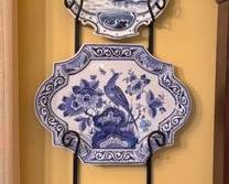 Blue and white plates and plate rack