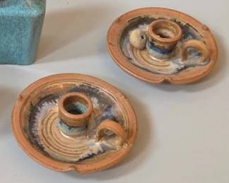 Pair of signed pottery candle holders