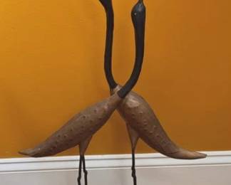 Large metal bird sculpture