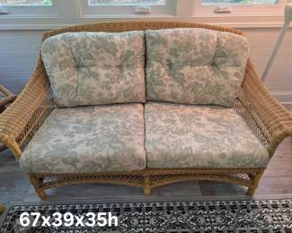 Natural-colored wicker loveseat