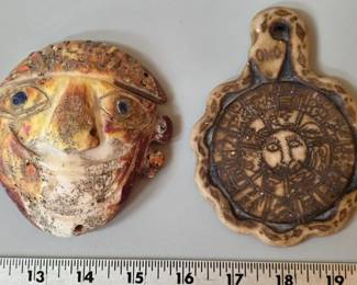 Decorative replicas of Peruvian Inca calendar stones