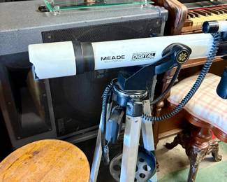 Large stereo speakers and telescope