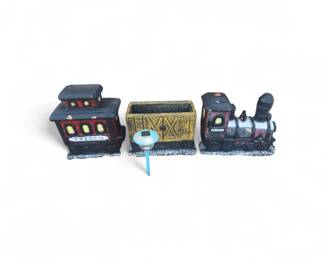 vintage ceramic train planters, often colored red and black