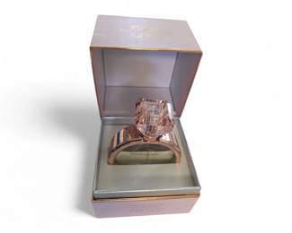 Jennifer Lopez Promise Eau de Parfum spray in a ring-shaped bottle