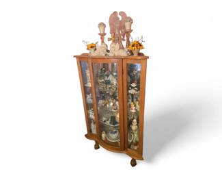 vintage American antique curved oak curio cabinet with a beveled glass door and mirror
