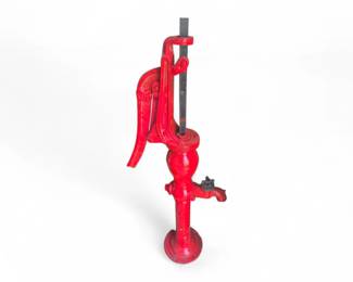 red antique cast iron water well pump