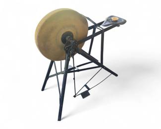 antiqu pedal-powered wet sandstone sharpening wheel