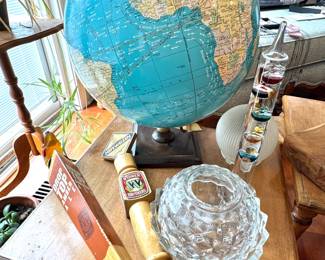$75, Blue Ocean Political Globe, $125, Galileo Thermometer, $45 Widmer Tap Handles