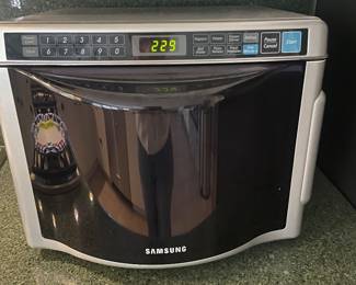 $150.00 - Samsung Space Saver Microwave MD800WC For Countertop