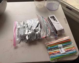 Silverwear, straws, drink stirrers