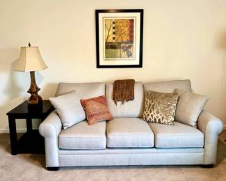 Grey Sleeper Sofa from Shubert FurnitureFurniture White, End Table, Table Lamp and Art