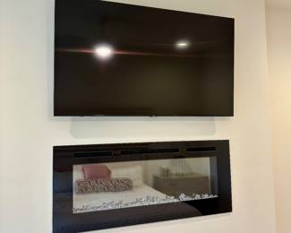 Flatscreen TV (Fireplace not for sale)