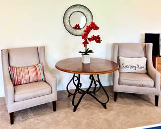 Grey Wingback Chairs, Round Dining Table, Mirror and Décor 