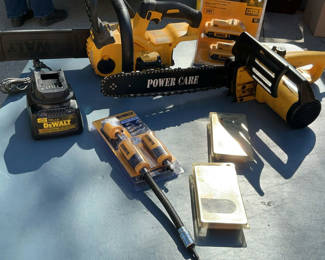 Lot 59: Two Chain Saws And Batteries