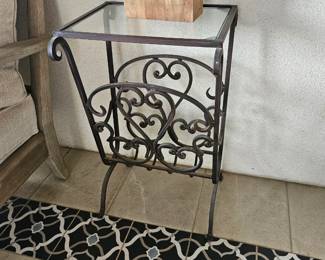 Metal and glass magazine holder and table.