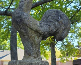 One of two concrete roosters
