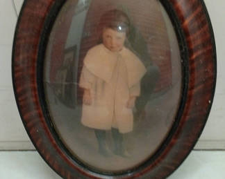 Lot 47: Antique convex portrait and frame