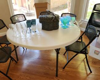 2 five foot round folding leg tables
