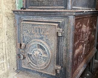Jotul cast iron wood stove with relief panels