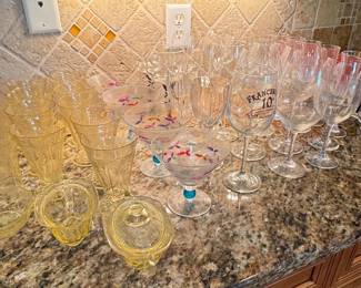 Assorted Glassware Lot with Yellow Depression-Era Pieces and Anniversary Wine Glasses