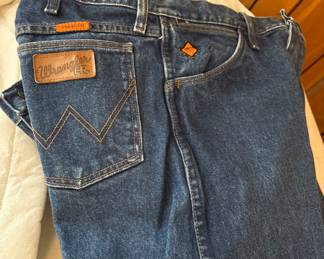 6 pair of men wrangle jeans