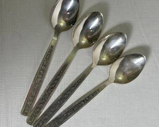 090 fourvintageteaspoonspossiblysilver