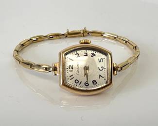 Lot 833  Vintage 14K Gold Ladies Optima Watch