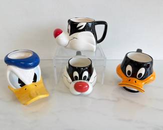Lot 5276  Vintage Looney Tunes Disney 3D Mugs  Daffy DuckSylvester the CatDonald Duck