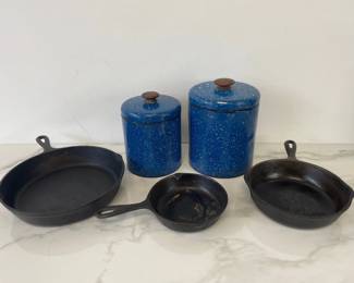 Lot 1381  3 Vintage Cast Iron Pans one Lodge 2 Vintage Ransburg Speckled Storage Tins
