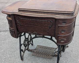 One of 3 antique sewing machines