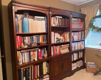 3 Bookshelves Mahogany filled with books 