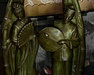 Incredible pair of Asian lamps, heavy plaster with shades. Man and woman these will be pricey