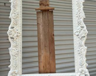 Oversized white frame/plastic great for a TV or hanging empty on a wall