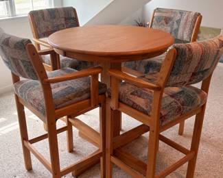 Gorgeous high top table with four chairs